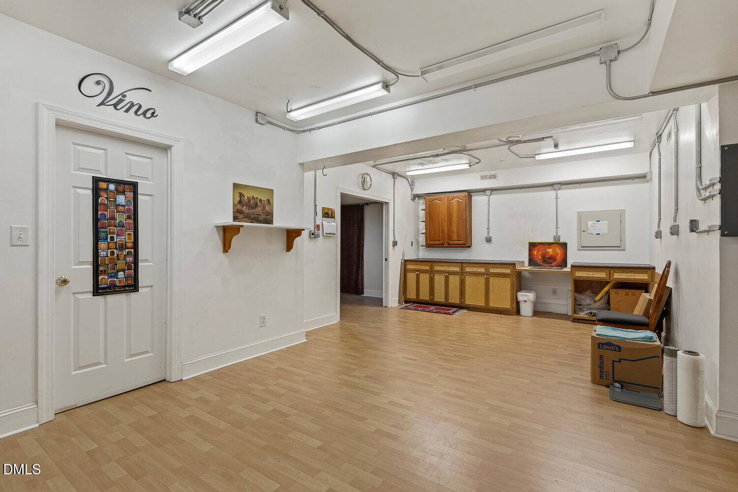 1505 October Road Raleigh, NC 27614 - Photo 53 of 76 a living room with furniture and a wooden floor