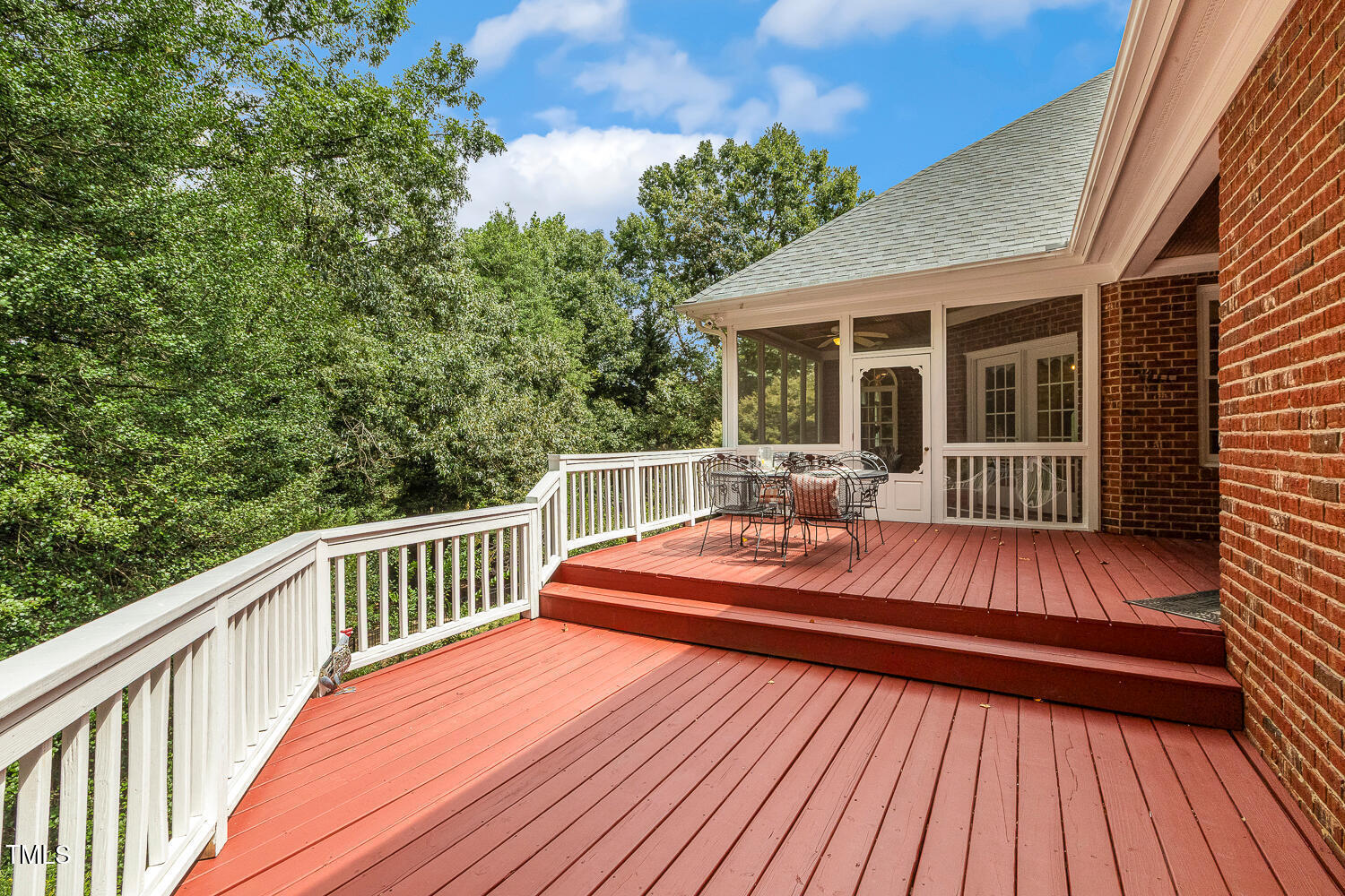 1505 October Road Raleigh, NC 27614 - Photo 61 of 76 a balcony with hardwood filled with table and chairs