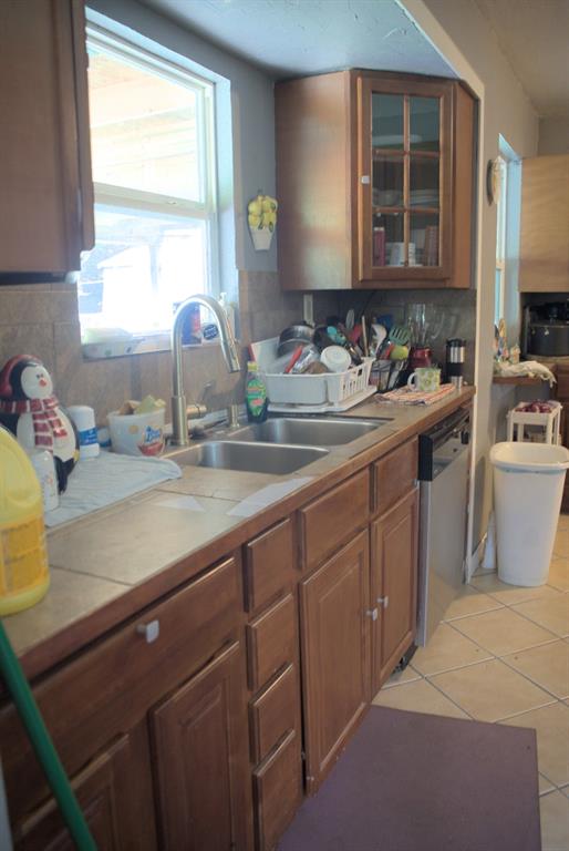531 Ridgecrest Drive Lewisville, TX 75067 - Photo 7 of 10 a kitchen with a sink and cabinets