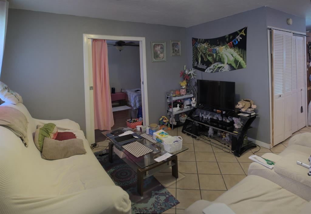 531 Ridgecrest Drive Lewisville, TX 75067 - Photo 10 of 10 a bedroom with a bed and a flat screen tv