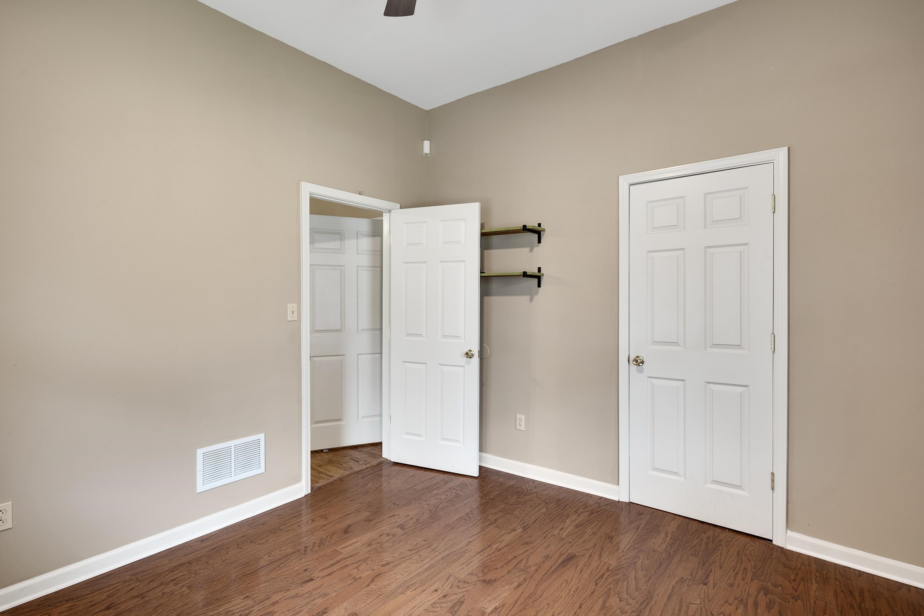 1003 New York Street Memphis, TN 38104 - Photo 21 of 40 an empty room with wooden floor