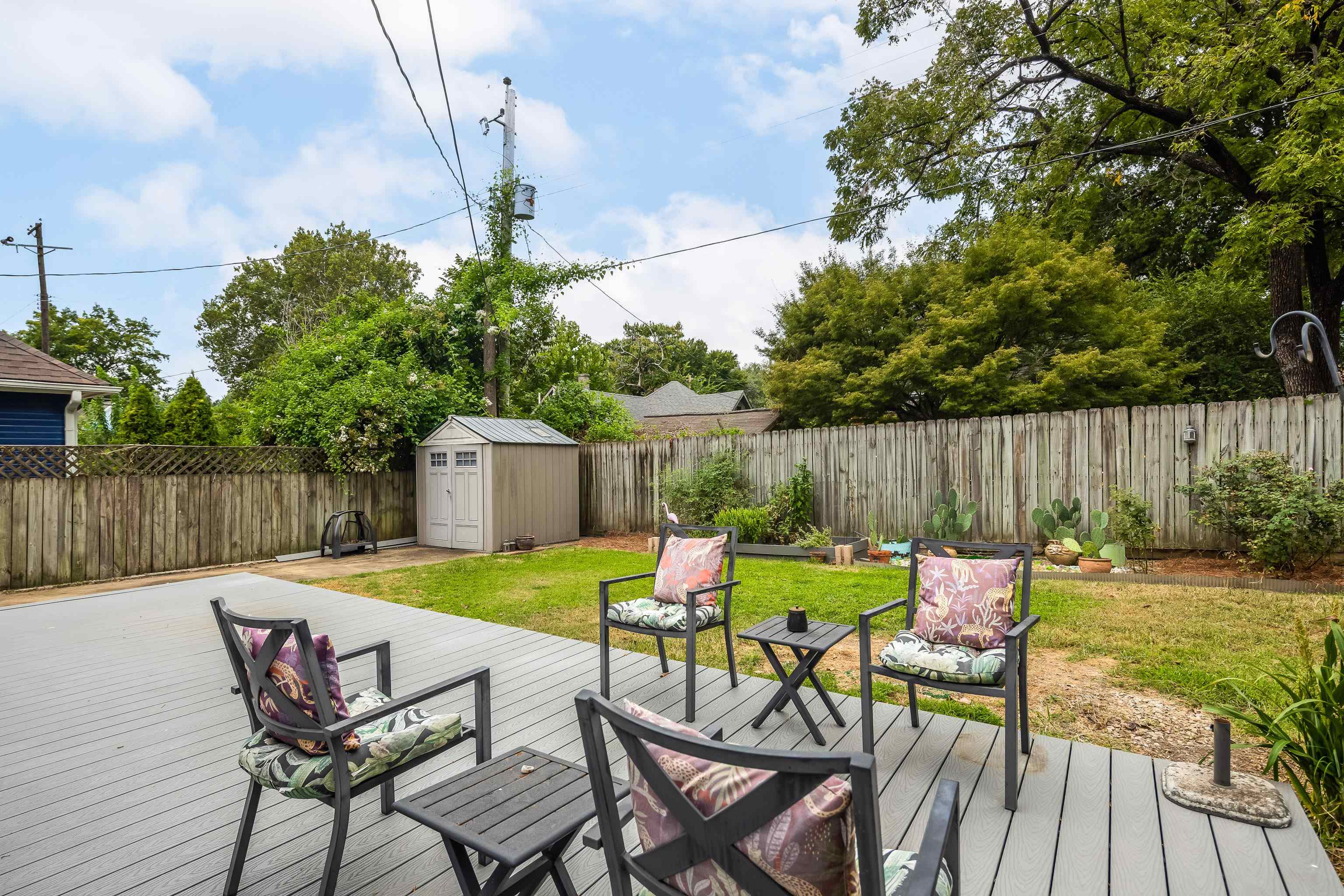 1003 New York Street Memphis, TN 38104 - Photo 37 of 40 a view of chairs and table in backyard of the house