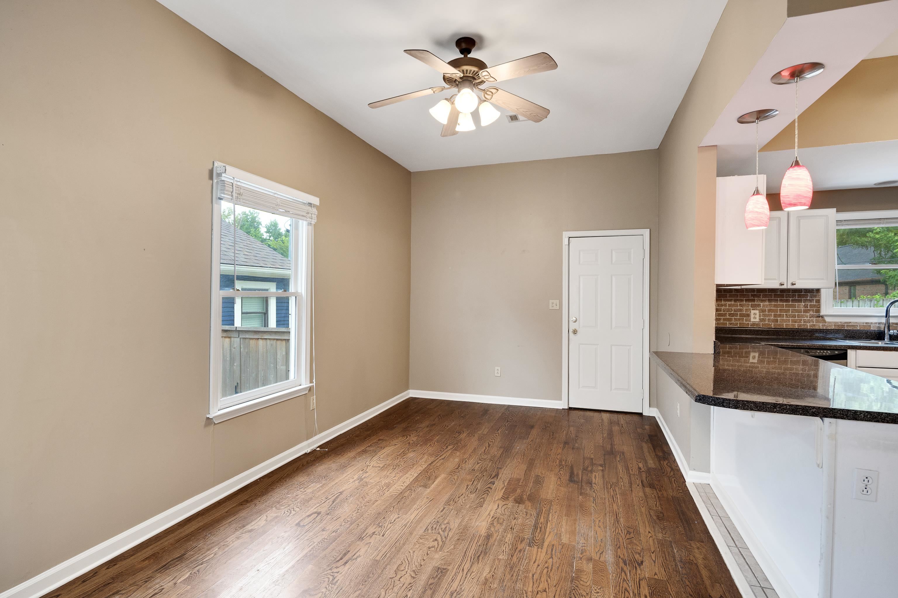 1003 New York Street Memphis, TN 38104 - Photo 9 of 40 wooden floor in an empty room with a window