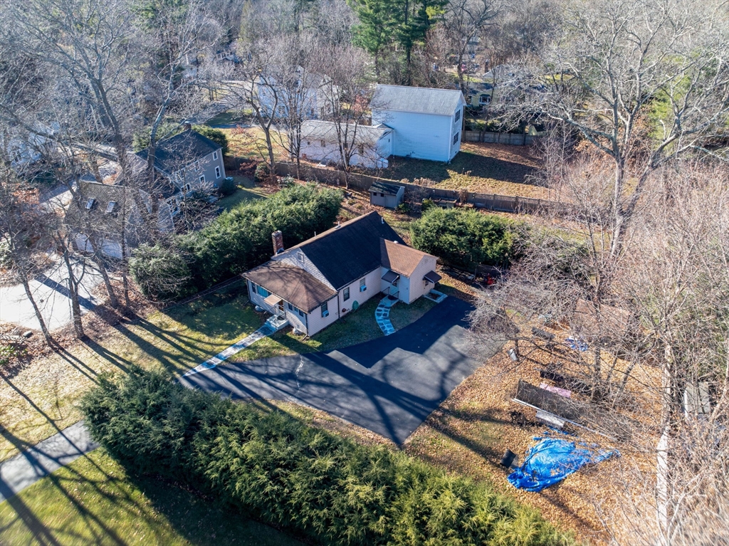 46 Upson Road Wellesley, MA 02482 - Photo 5 of 16 an aerial view of a house with garden space and a street view