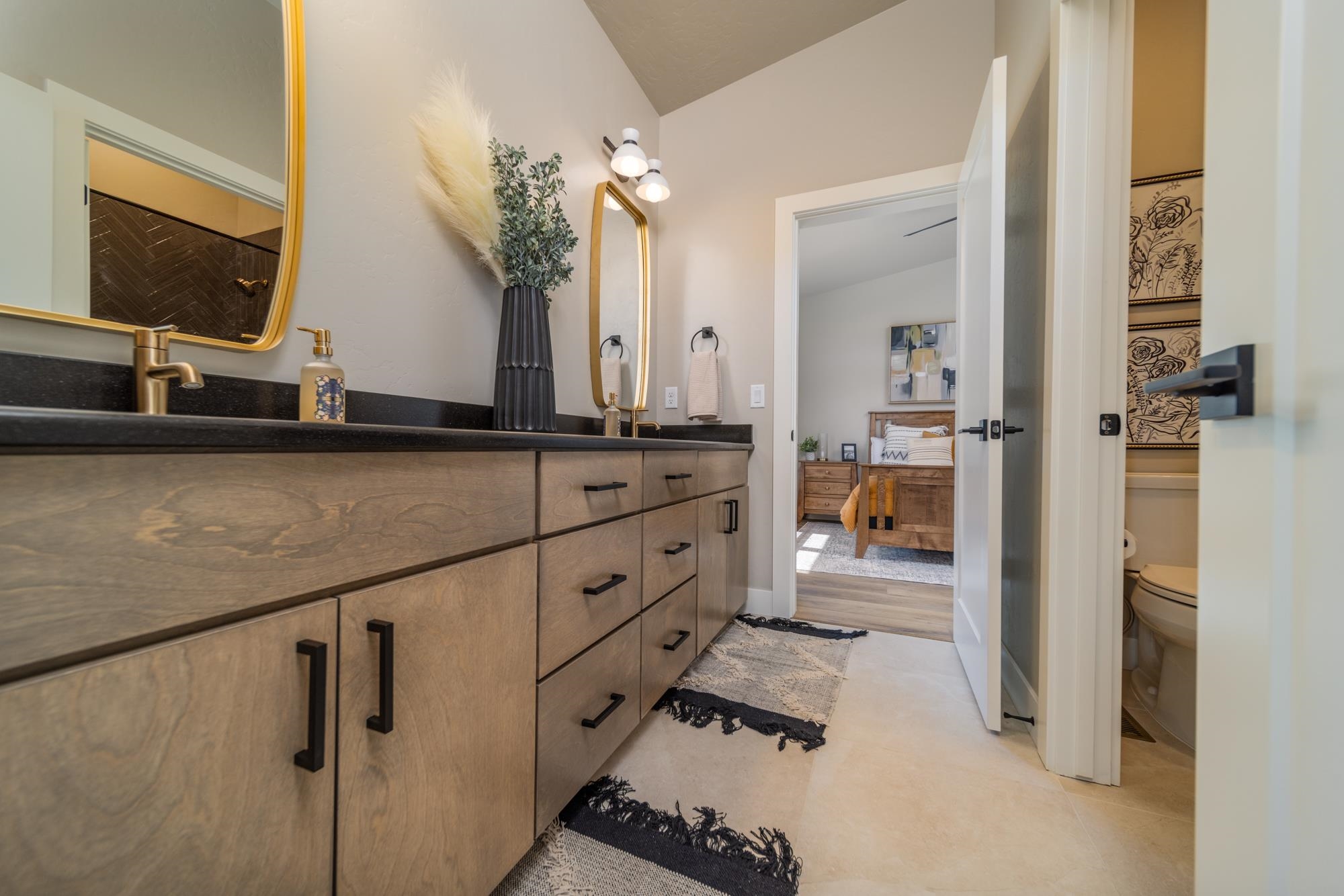 2260 Pyramid Peak Loop Grand Junction, CO 81507 - Photo 13 of 41 a bathroom with a sink and a mirror