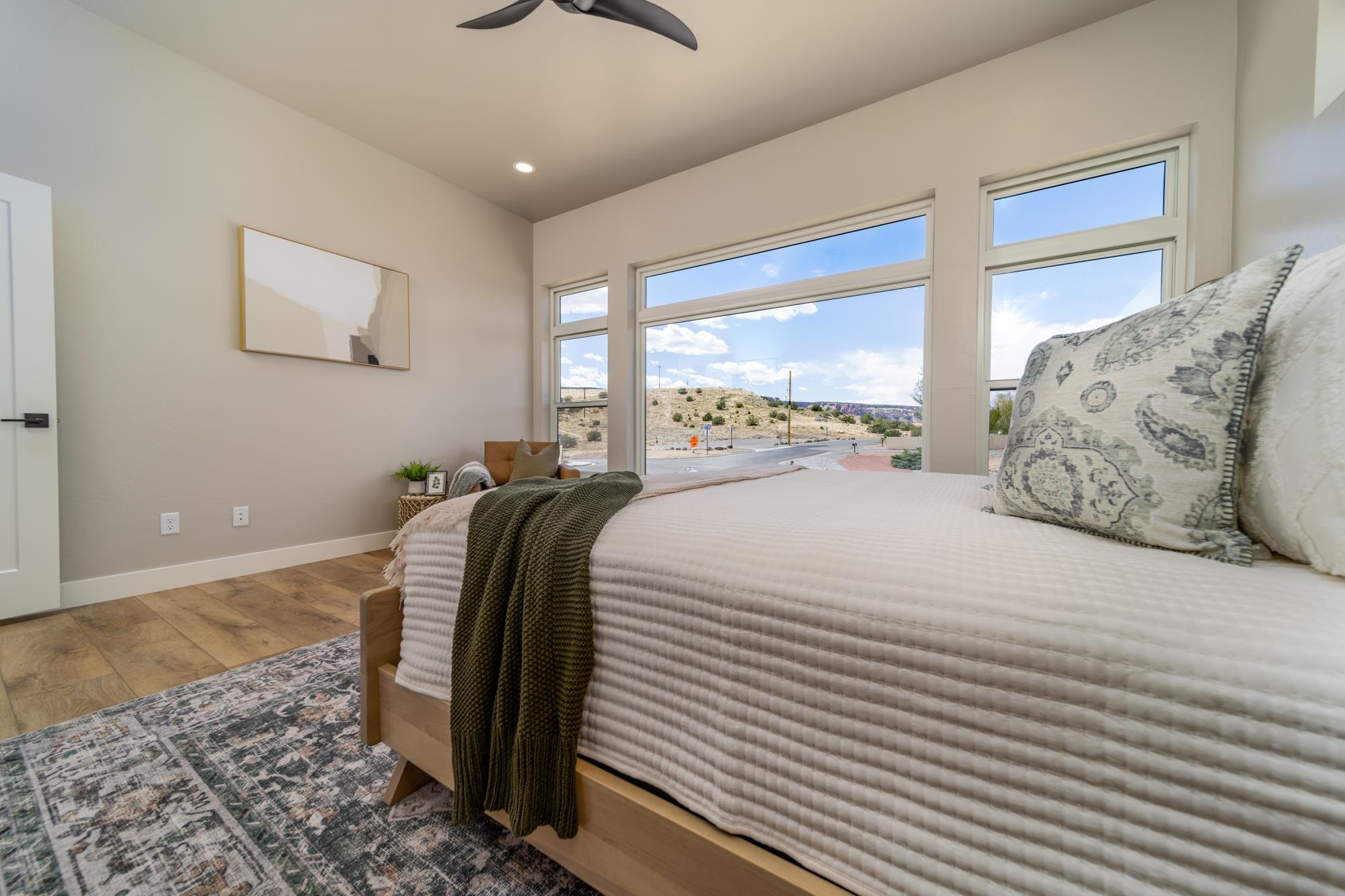 2260 Pyramid Peak Loop Grand Junction, CO 81507 - Photo 21 of 41 a large bed sitting in a bedroom next to a window