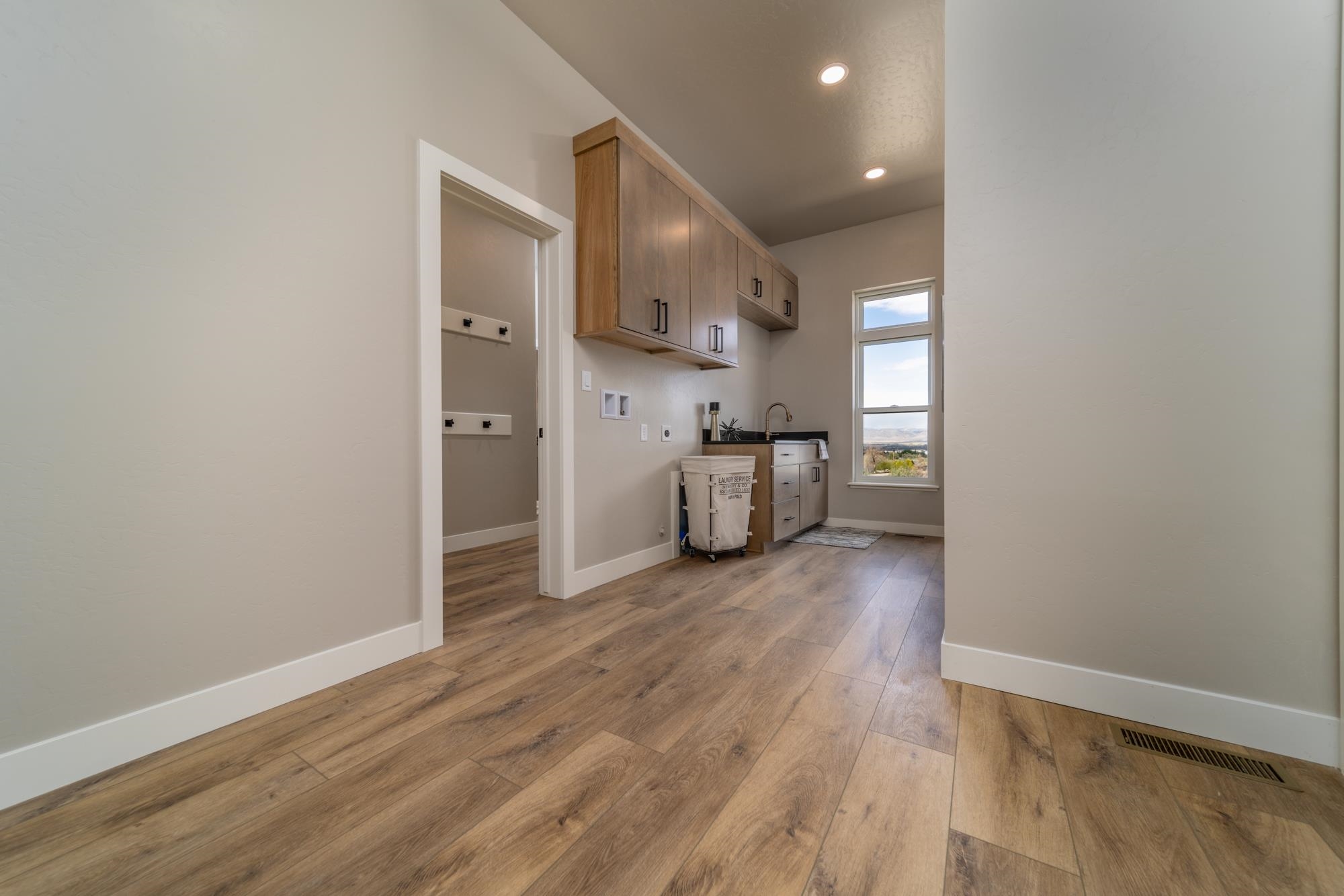 2260 Pyramid Peak Loop Grand Junction, CO 81507 - Photo 28 of 41 a view of empty room with wooden floor and window