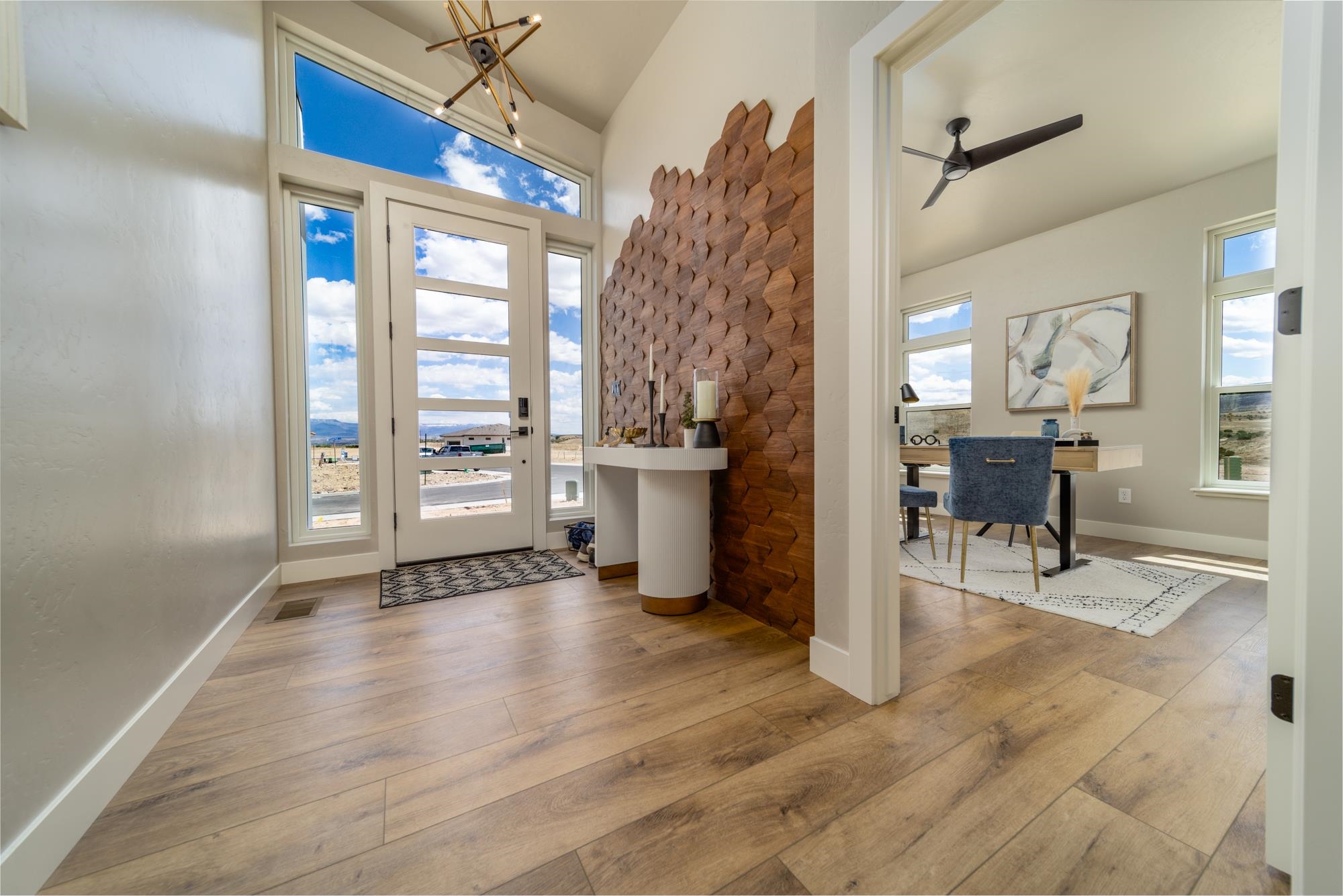 2260 Pyramid Peak Loop Grand Junction, CO 81507 - Photo 3 of 41 a view of a livingroom with wooden floor and furniture