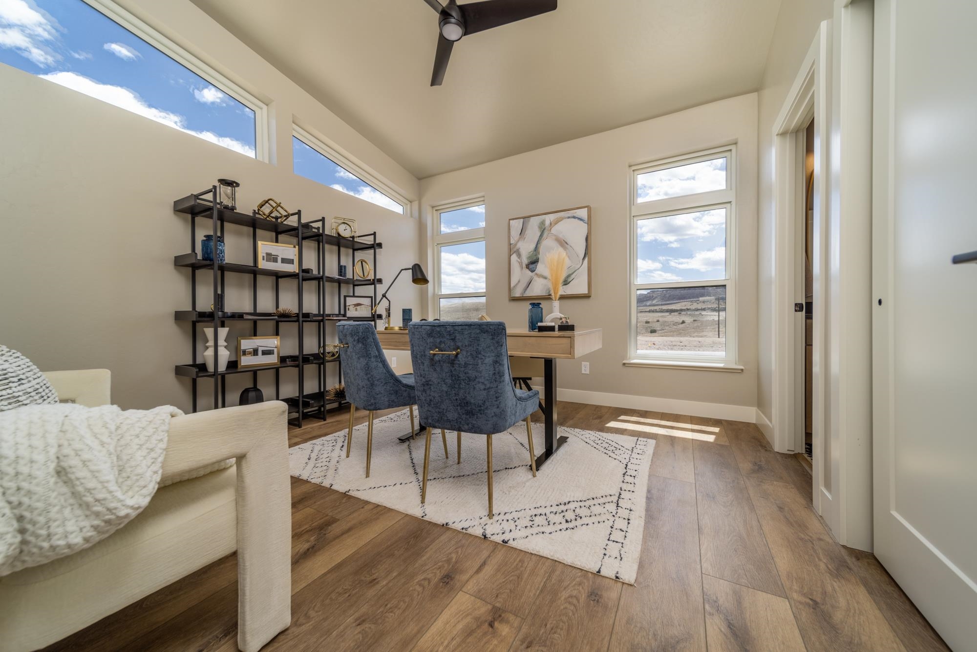 2260 Pyramid Peak Loop Grand Junction, CO 81507 - Photo 5 of 41 a view of a livingroom with furniture and window