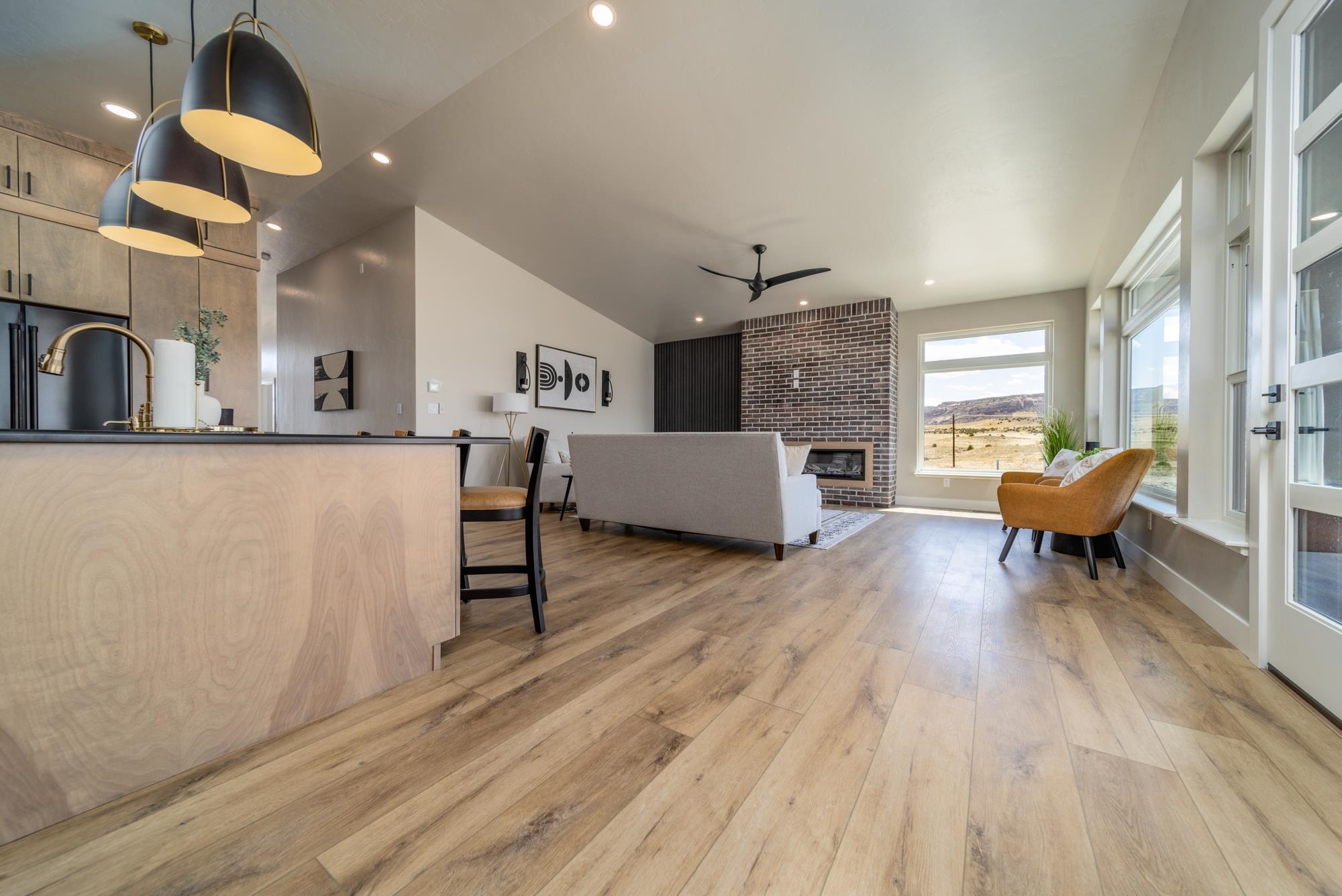 2260 Pyramid Peak Loop Grand Junction, CO 81507 - Photo 6 of 41 a living room with furniture and a wooden floor