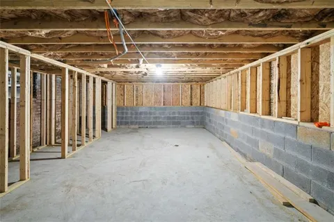 a view of an empty room with stairs
