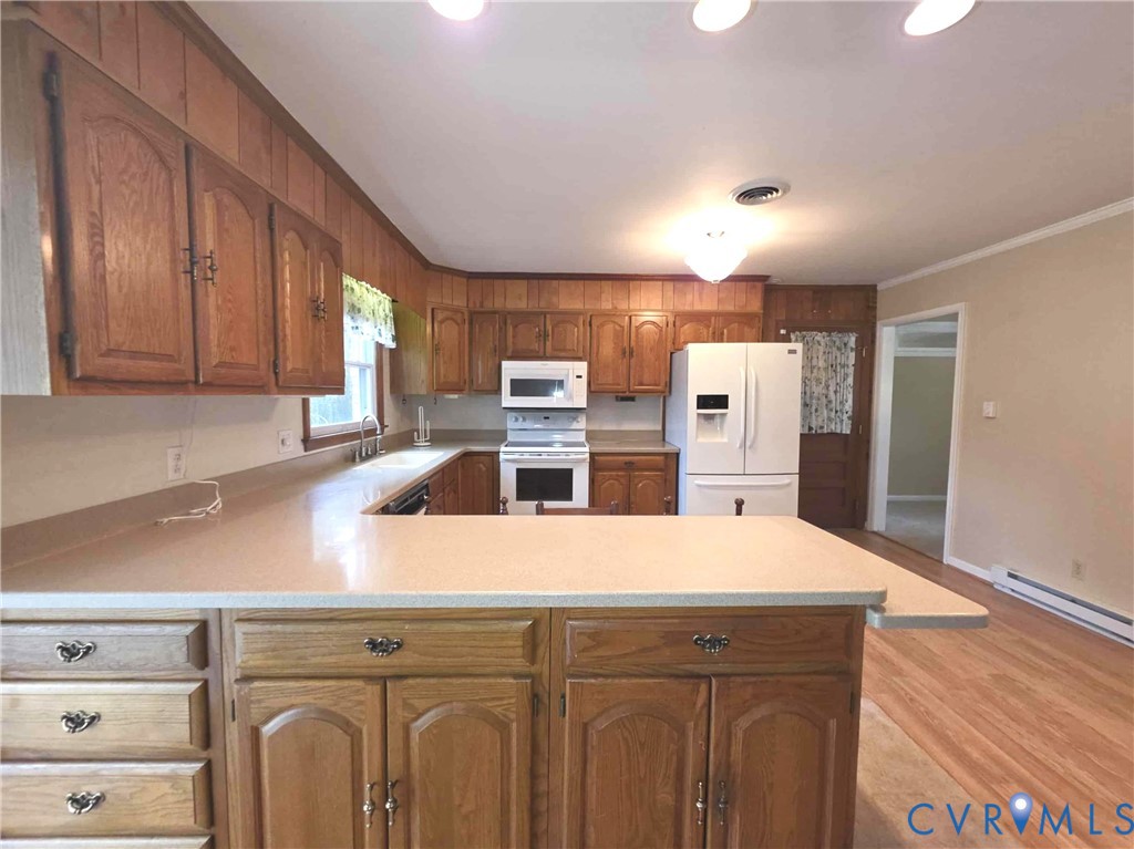 199 Ruritan Drive Emporia, VA 23847 - Photo 16 of 35 a kitchen with a refrigerator and microwave