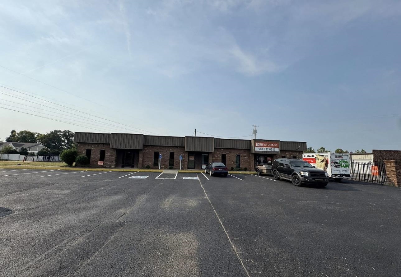 4705 Mueller Brass Road Covington, TN 38019 - Photo 6 of 9 a view of street with parked cars