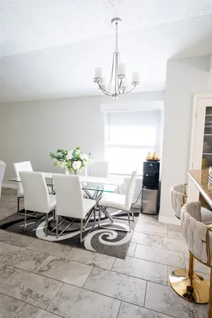 a view of a dining room with furniture
