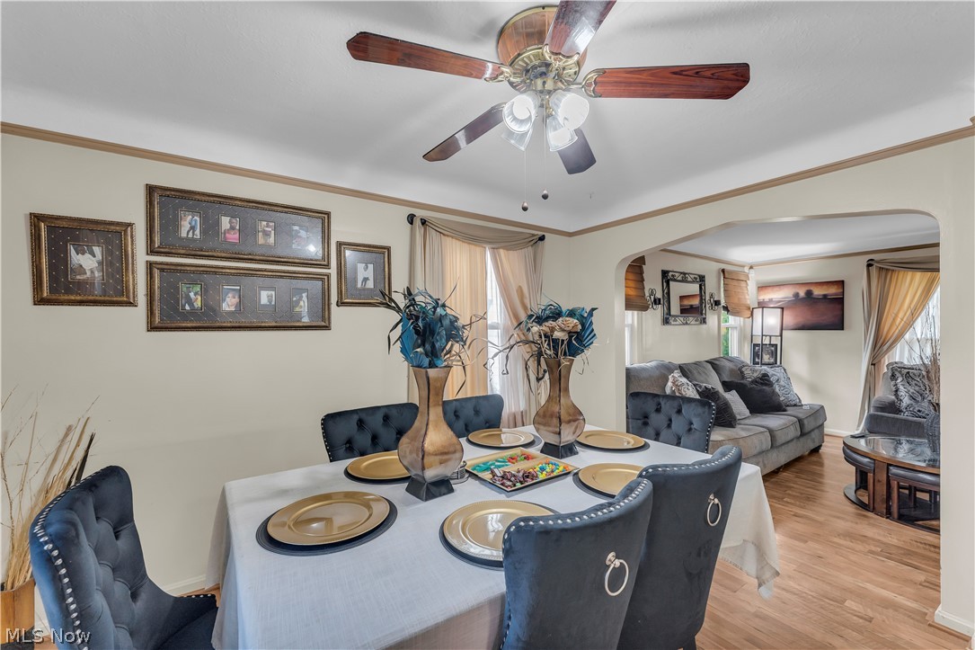3962 Grosvenor Road South Euclid, OH 44118 - Photo 8 of 27 Dining area with wood-finish flooring and a ceiling fan with integrated lighting