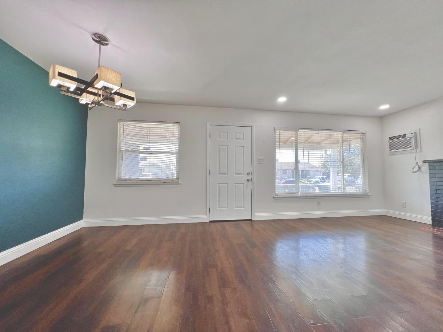 3689 McClellan Drive North Highlands, CA 95660 - Photo 17 of 20 a view of an empty room with wooden floor and a window
