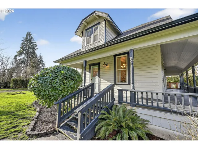 a balcony view with a garden space