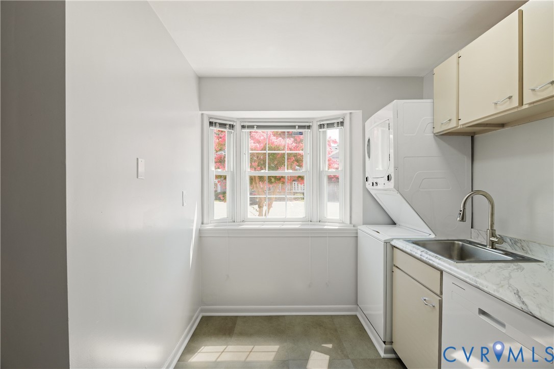 9129 Derbyshire Road, Unit E Henrico, VA 23229 - Photo 10 of 36 Utility area featuring a bay window, a stacked was