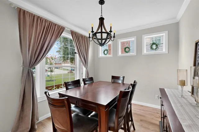 a white bath tub sitting next to a white sink