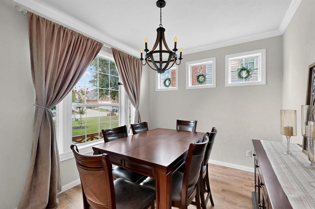 2820 Appaloosa Court Little Elm, TX 75068 - Photo 20 of 40 a view of a dining room with furniture window and outside view