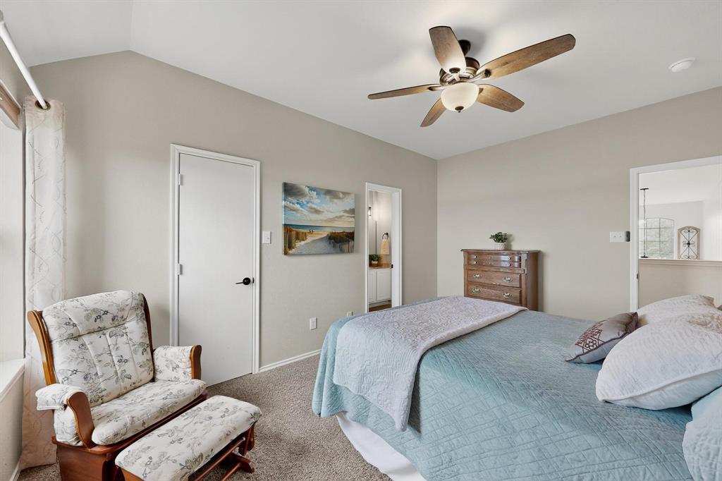 2820 Appaloosa Court Little Elm, TX 75068 - Photo 33 of 40 a bedroom with a bed furniture and a window