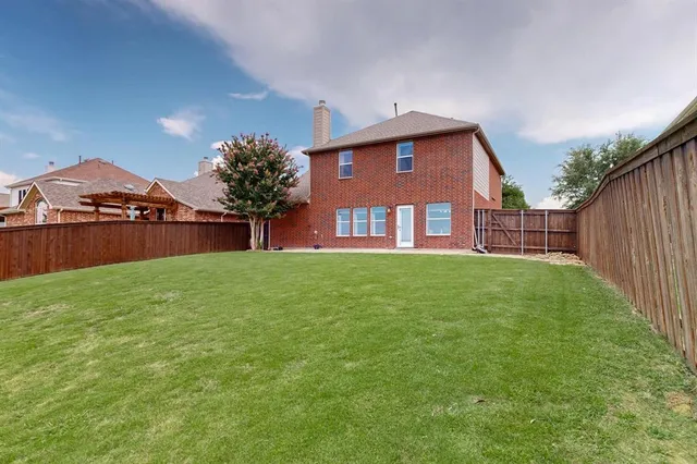 a view of a golf course with a garden