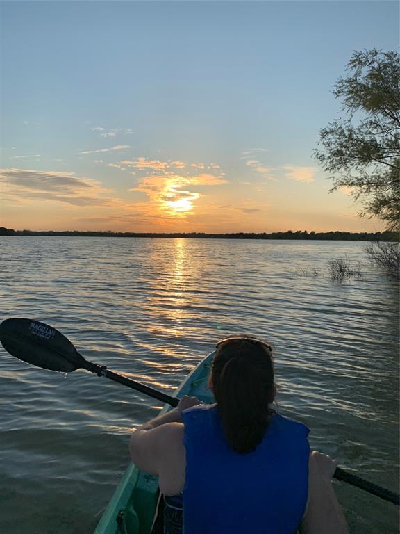 2820 Appaloosa Court Little Elm, TX 75068 - Photo 7 of 40 a view of roof deck with wooden floor and lake view