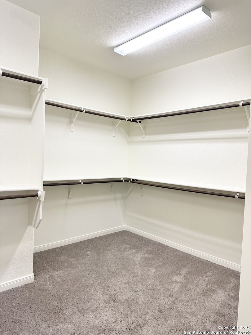 218 Iron Gate Pleasanton, TX 78064 - Photo 14 of 15 a view of an empty walk in closet
