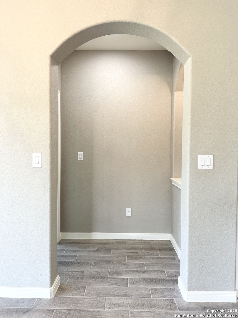 218 Iron Gate Pleasanton, TX 78064 - Photo 9 of 15 a view of empty room