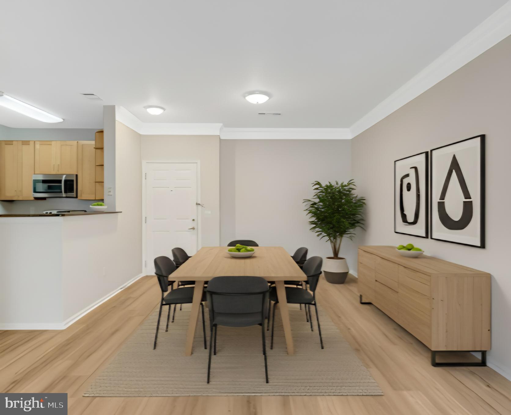 1580 Spring Gate Dr., Unit 4111 McLean, VA 22102 - Photo 8 of 34 Virtually staged dining area