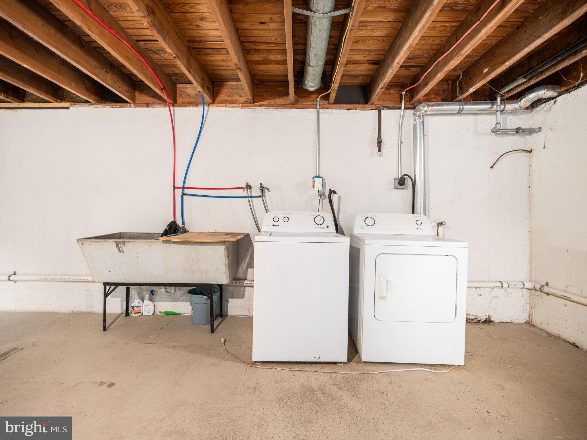 8 Rock Raymond Road Downingtown, PA 19335 - Photo 16 of 22 Functional laundry area with ample space.