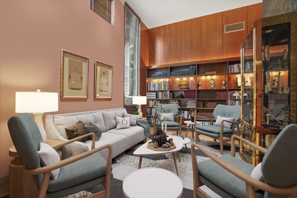 64 Highland Street Cambridge, MA 02138 - Photo 11 of 41 a living room with furniture a lamp and large window