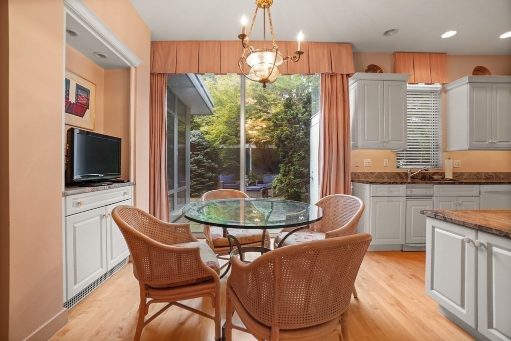 64 Highland Street Cambridge, MA 02138 - Photo 21 of 41 a view of a dining room with furniture window and outside view