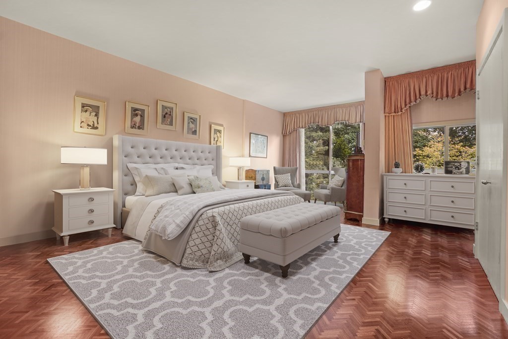 64 Highland Street Cambridge, MA 02138 - Photo 22 of 41 a bedroom with a large bed and a couch