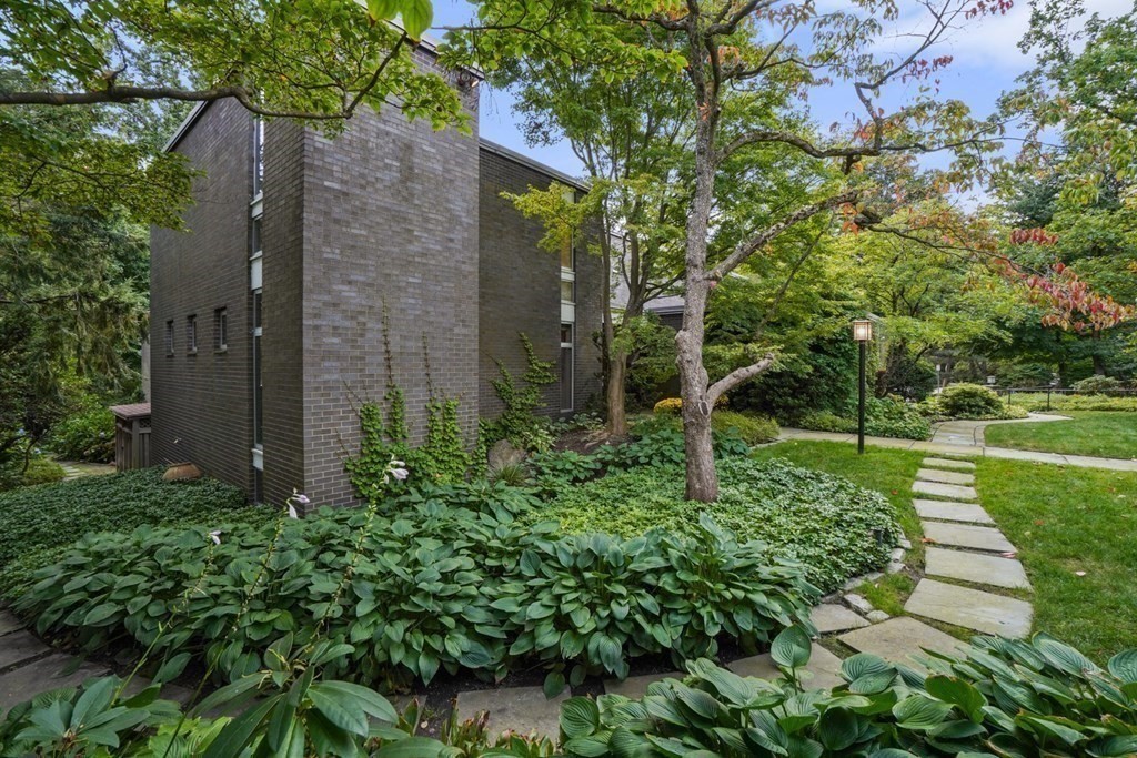 64 Highland Street Cambridge, MA 02138 - Photo 38 of 41 a backyard of a house with lots of green space