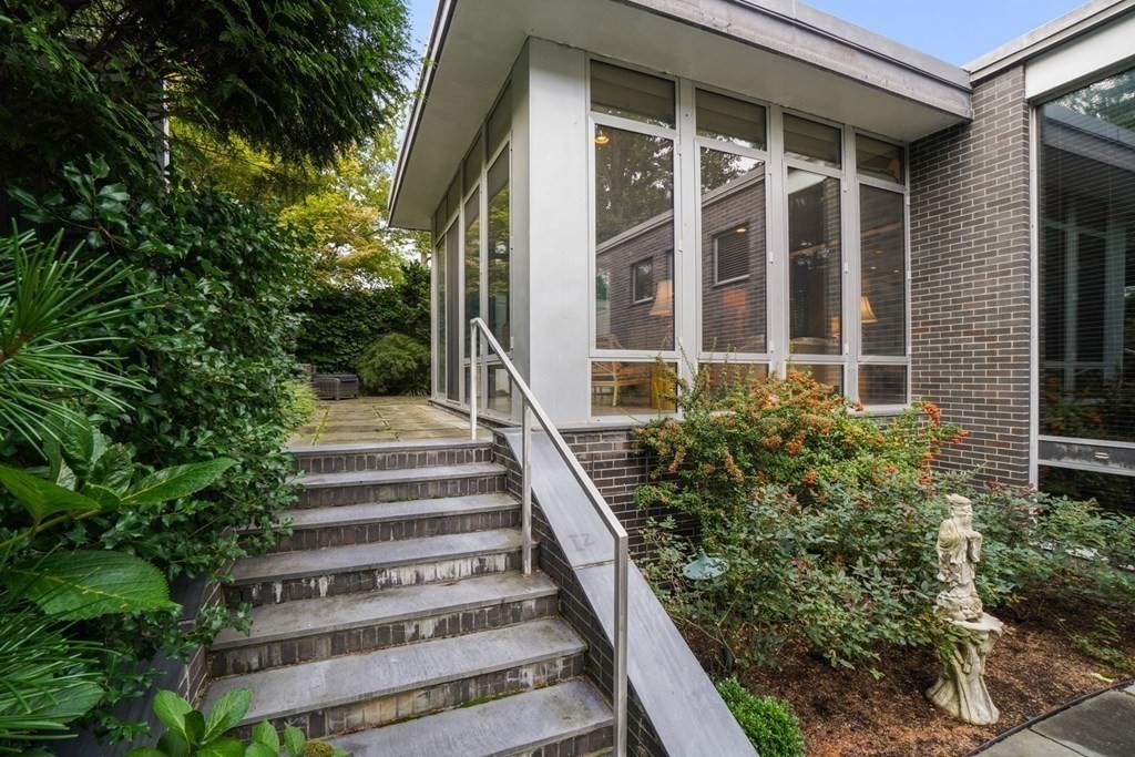 64 Highland Street Cambridge, MA 02138 - Photo 40 of 41 a view of a house with a window