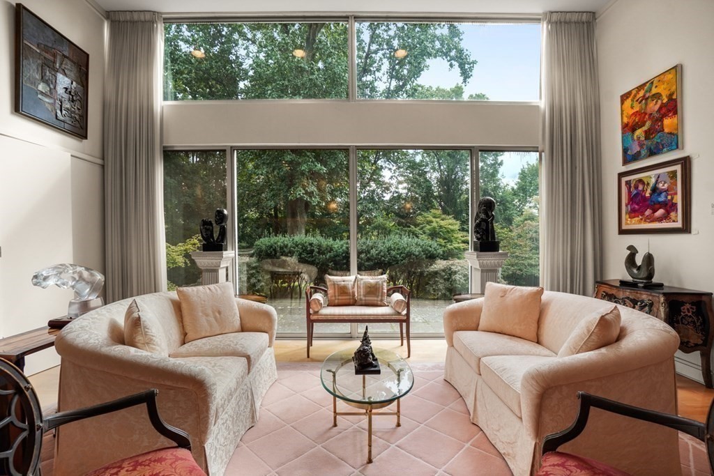 64 Highland Street Cambridge, MA 02138 - Photo 7 of 41 a living room with furniture and a large window