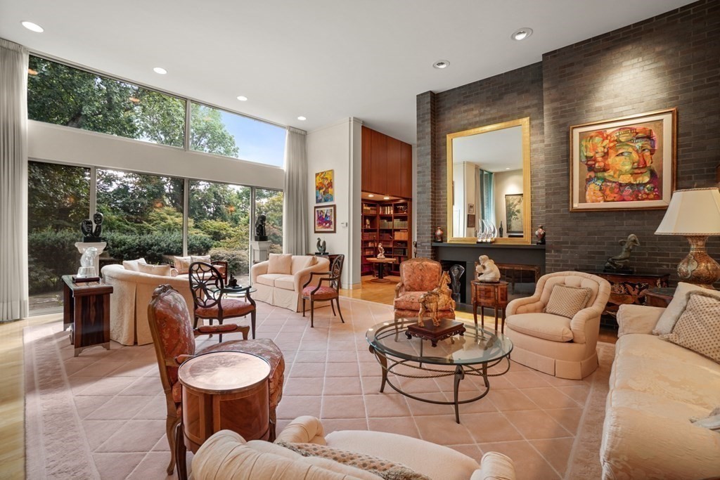 64 Highland Street Cambridge, MA 02138 - Photo 8 of 41 a living room with furniture and a large window