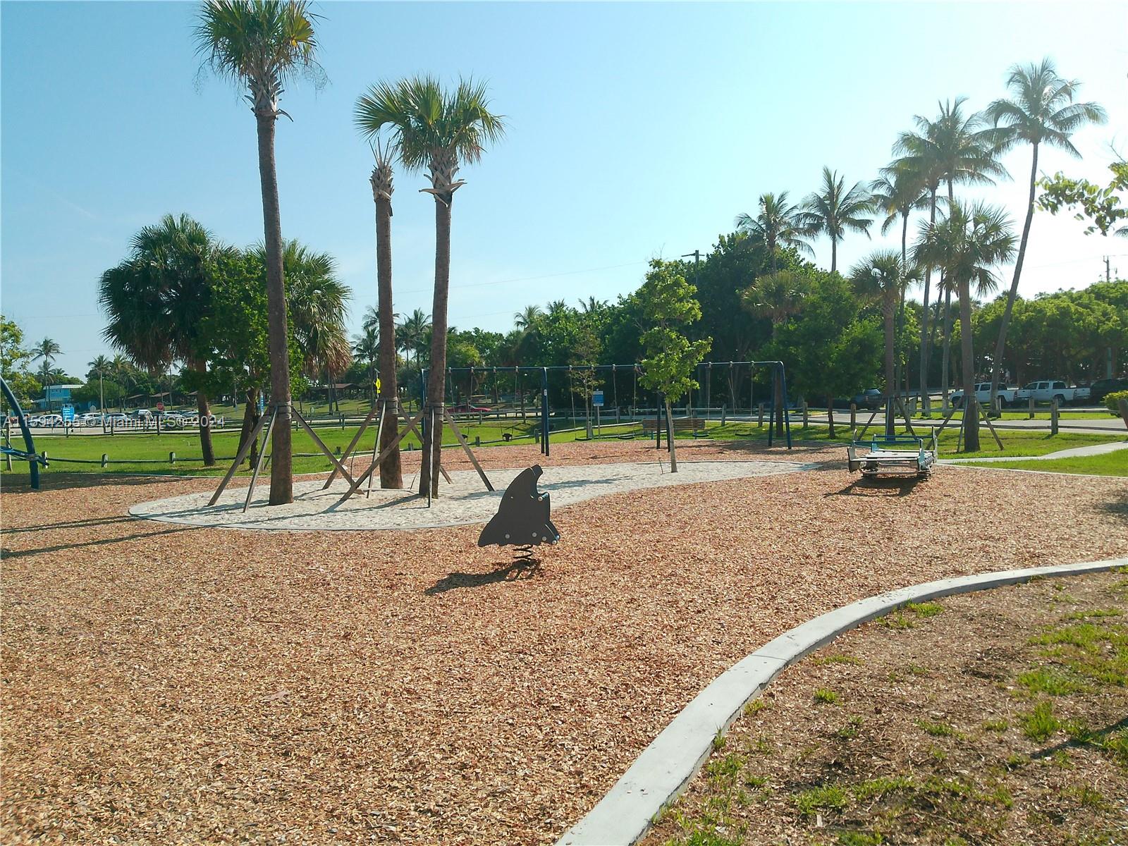 1100 East Indiantown Road, Unit 110 Jupiter, FL 33477 - Photo 18 of 19 a view of a park with palm trees