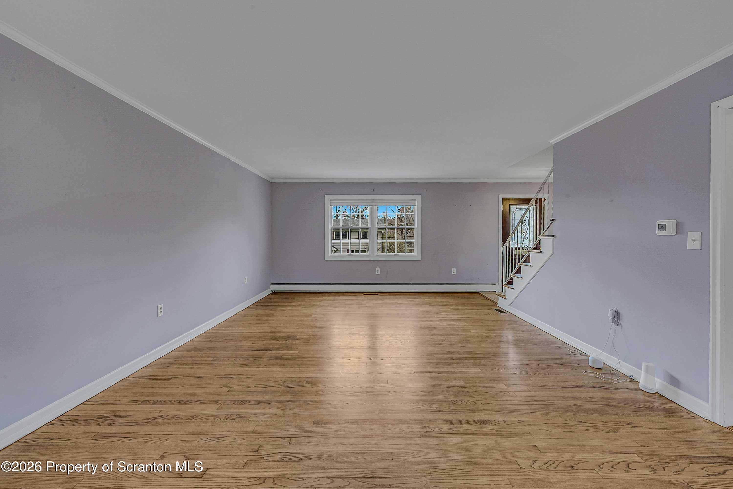 108 Sturbridge Road Clarks Summit, PA 18411 - Photo 15 of 67 wooden floor in an empty room with a window