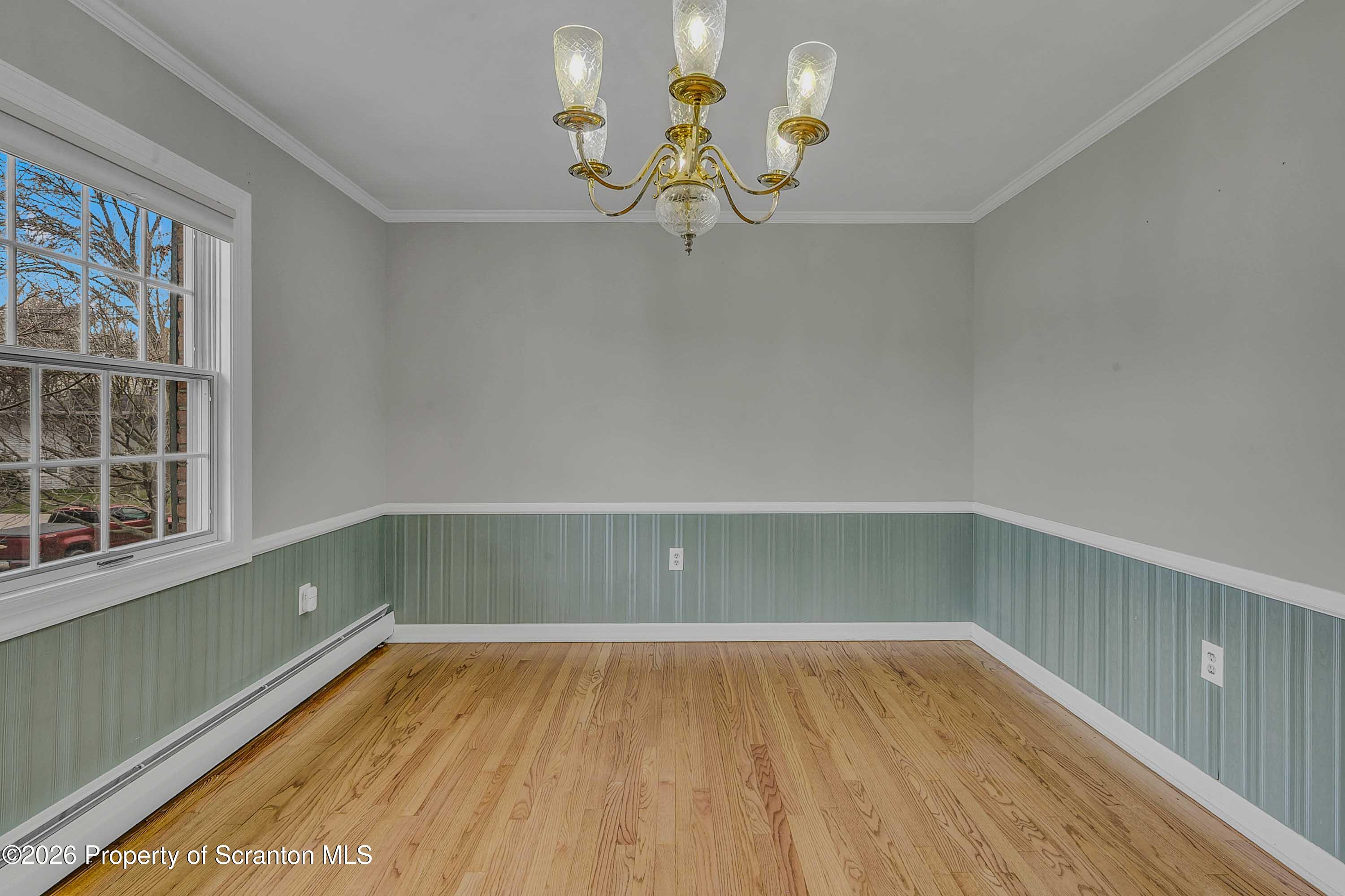 108 Sturbridge Road Clarks Summit, PA 18411 - Photo 18 of 67 a view of room with window and wooden floor