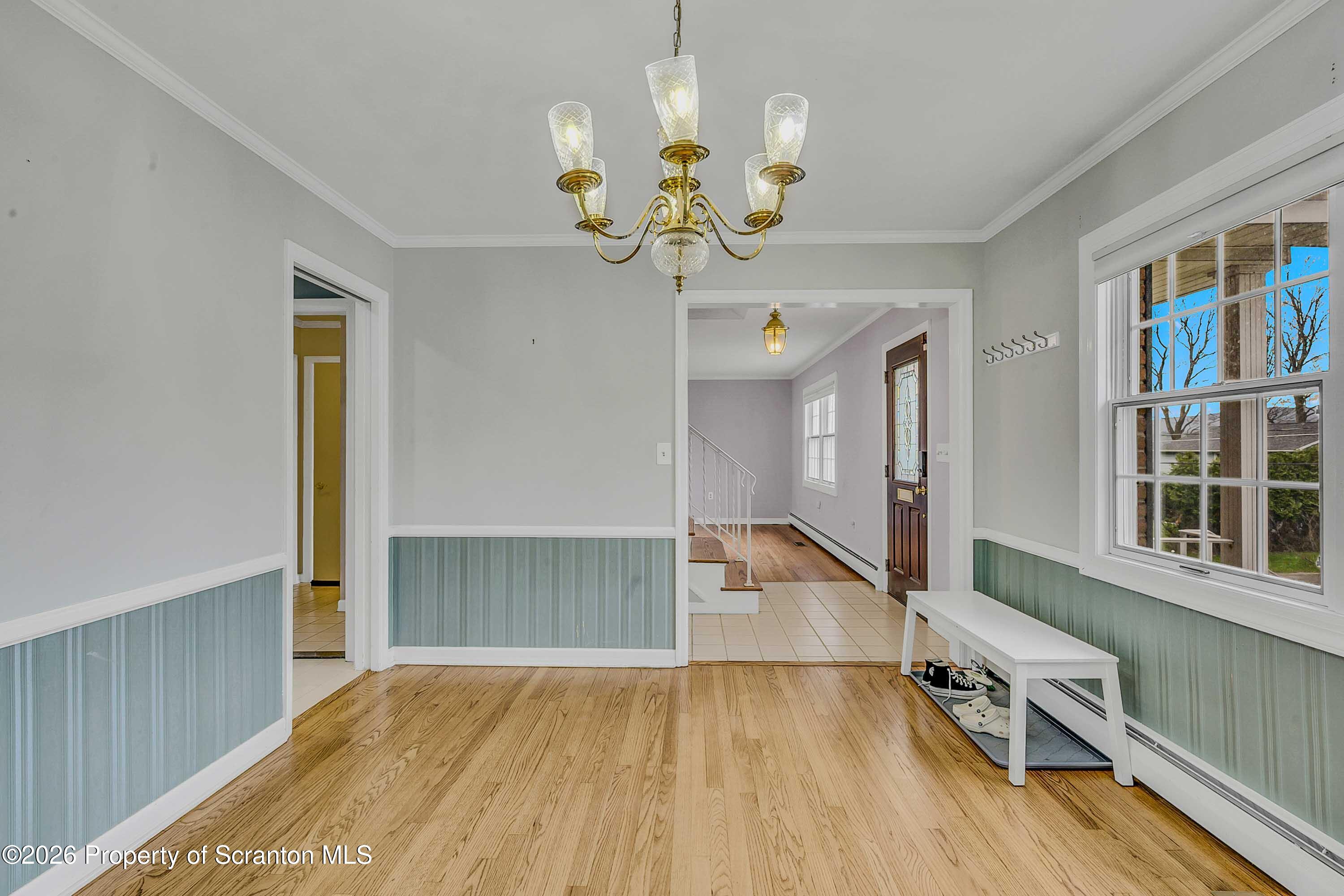 108 Sturbridge Road Clarks Summit, PA 18411 - Photo 19 of 67 a view of an empty room with a window and wooden floor