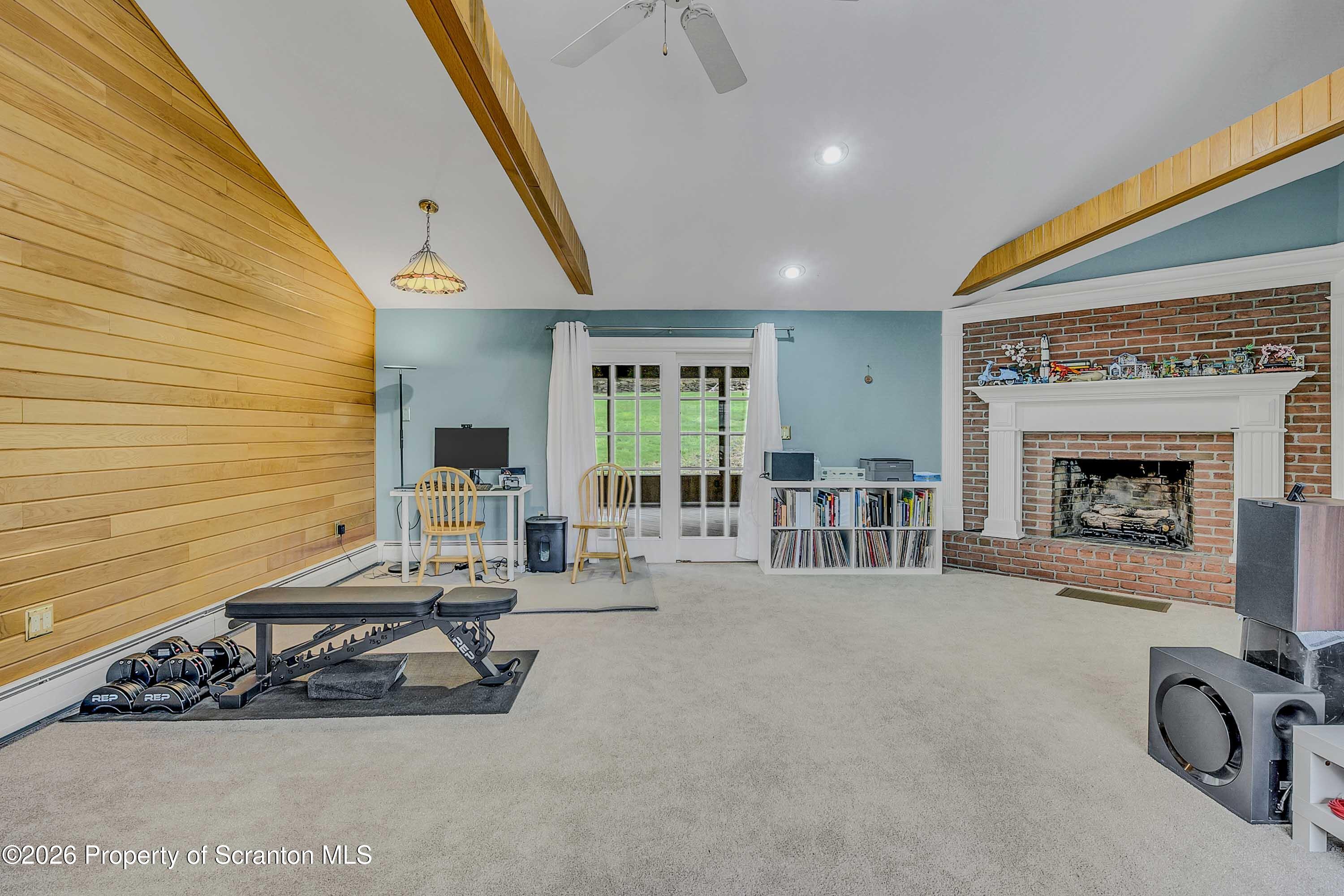108 Sturbridge Road Clarks Summit, PA 18411 - Photo 24 of 67 a view of a livingroom with furniture and a fireplace