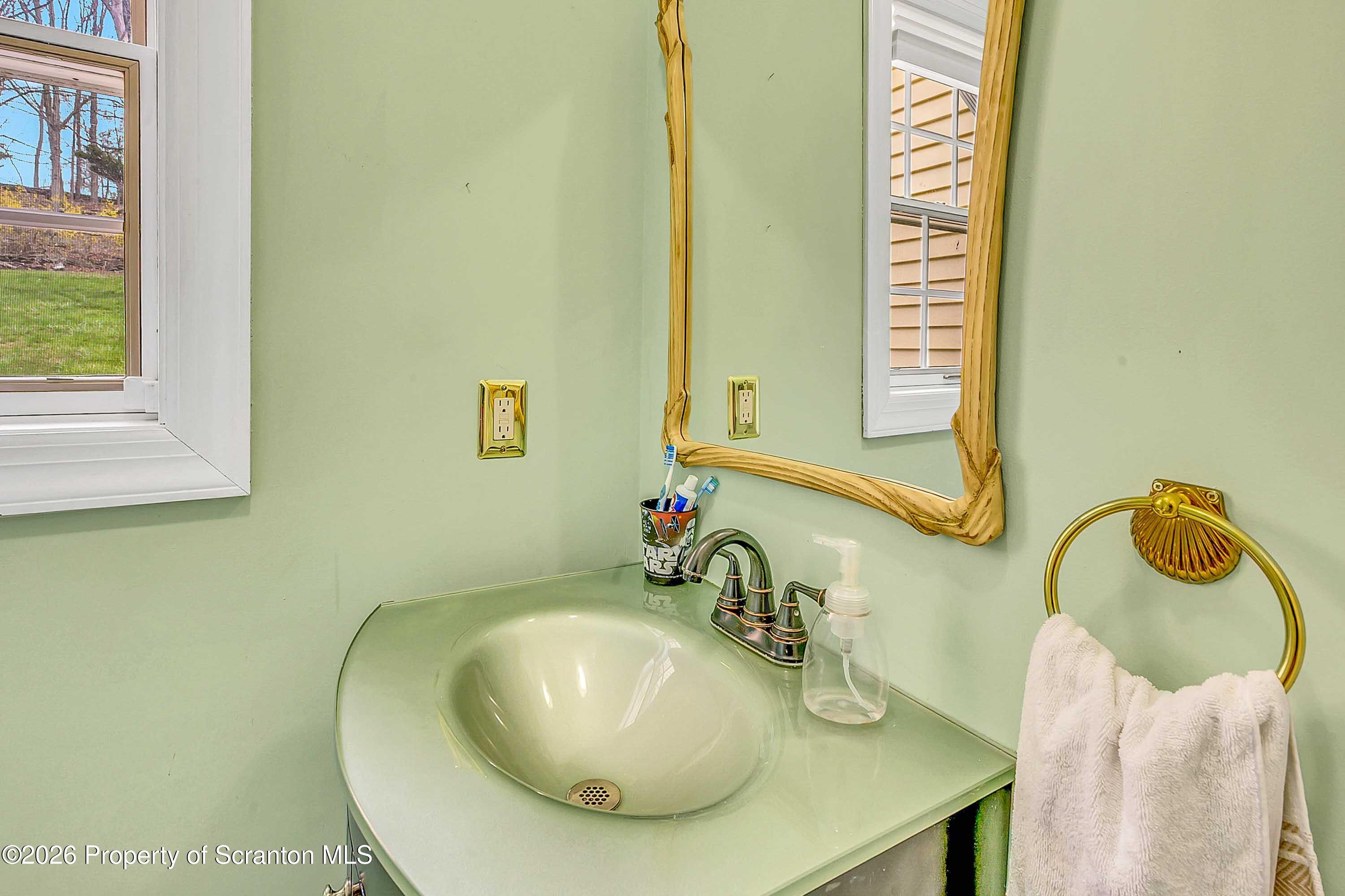 108 Sturbridge Road Clarks Summit, PA 18411 - Photo 38 of 67 a bathroom with a sink and a mirror