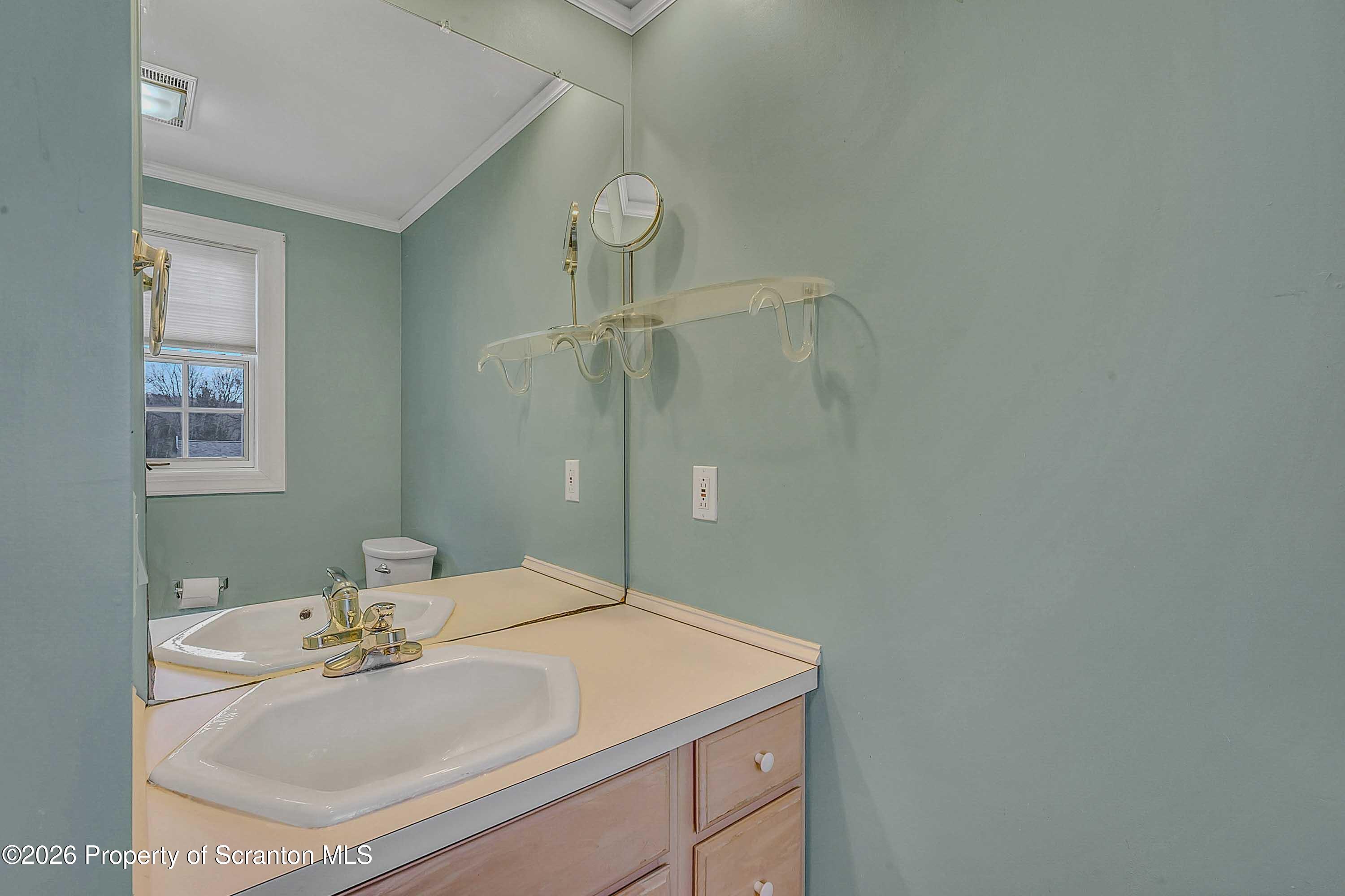 108 Sturbridge Road Clarks Summit, PA 18411 - Photo 43 of 67 a bathroom with a sink a vanity and a mirror