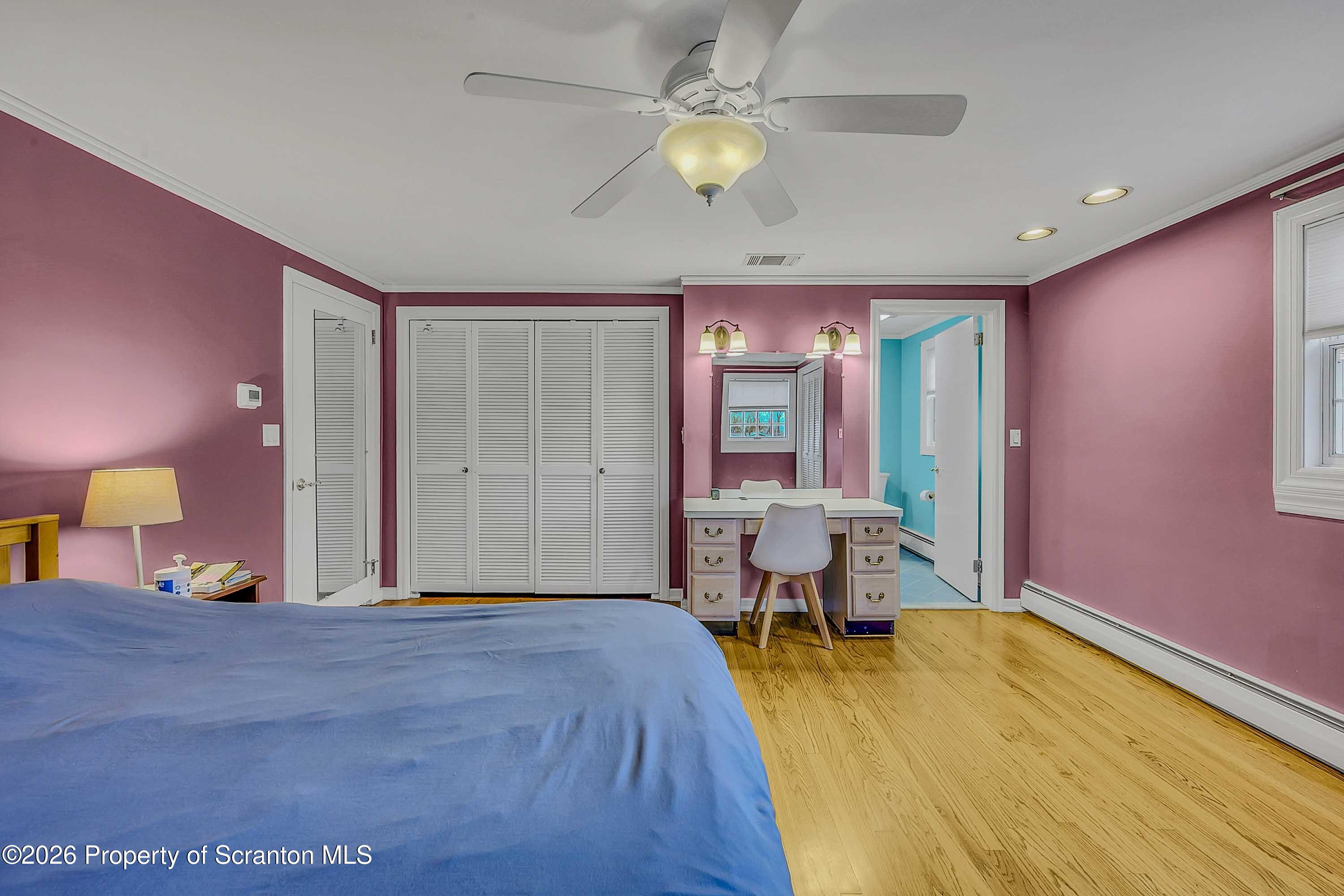 108 Sturbridge Road Clarks Summit, PA 18411 - Photo 45 of 67 a spacious bedroom with a bed and a chandelier