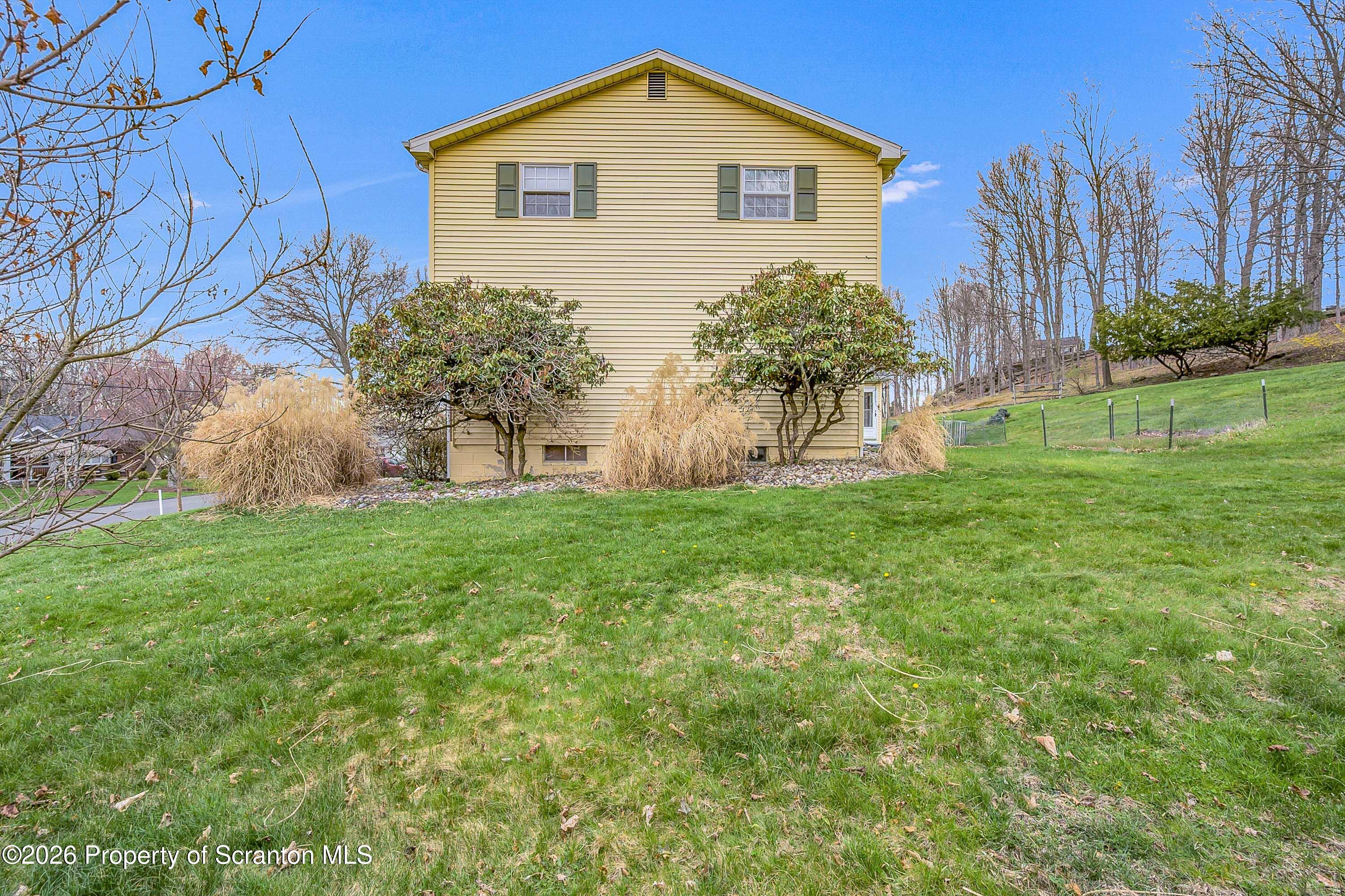 108 Sturbridge Road Clarks Summit, PA 18411 - Photo 56 of 67 a front view of a house with garden