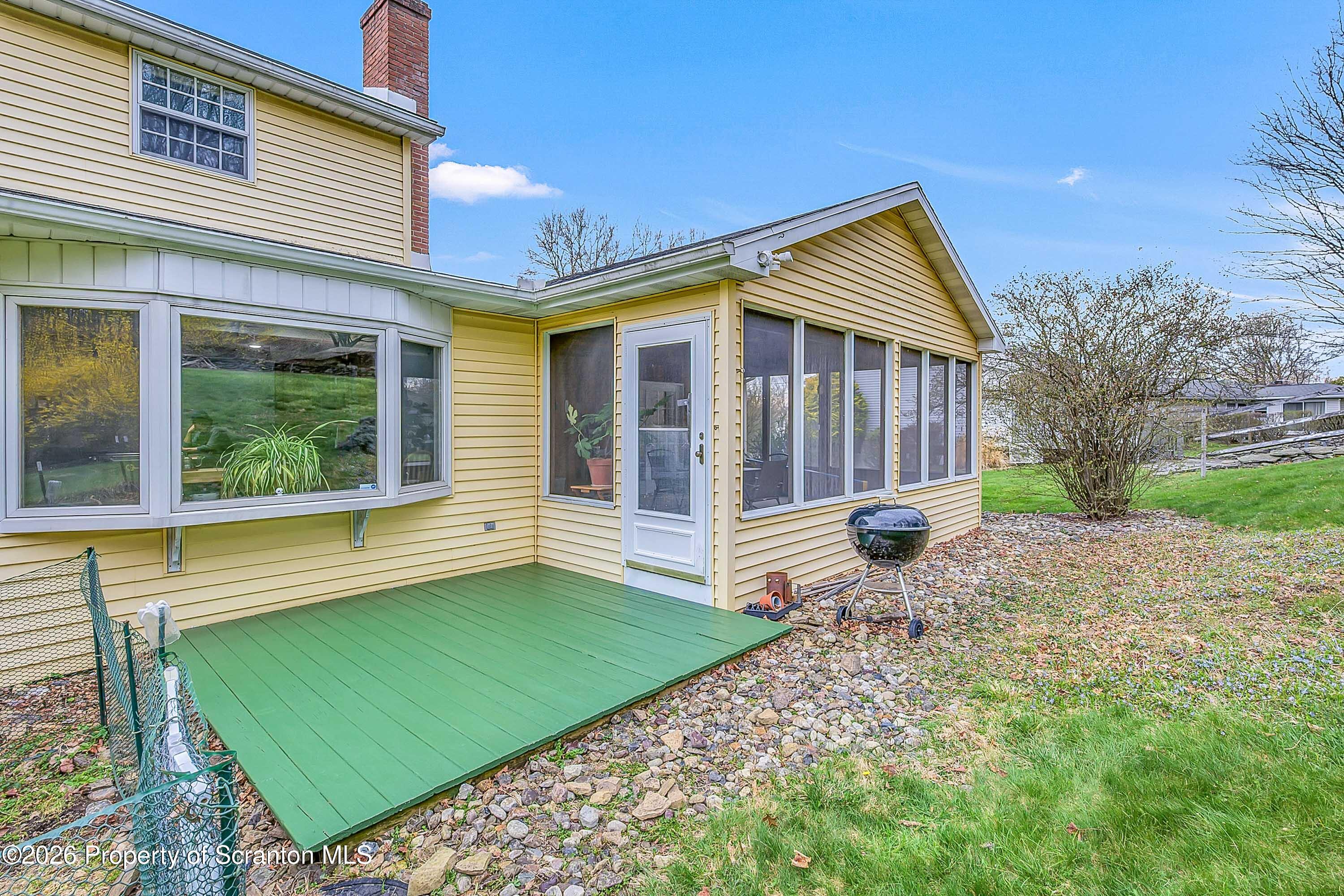 108 Sturbridge Road Clarks Summit, PA 18411 - Photo 6 of 67 a view of a house with backyard and porch