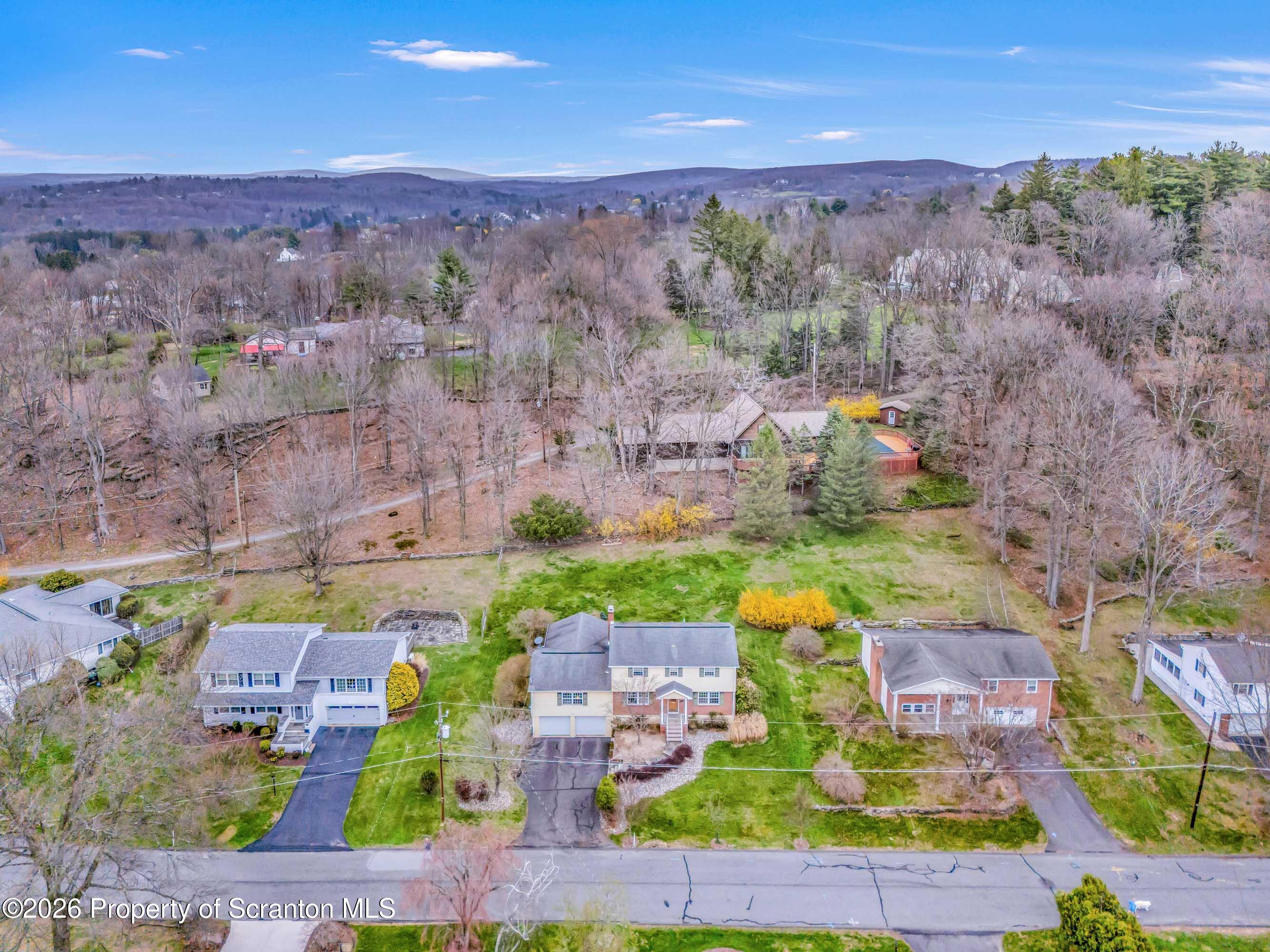 108 Sturbridge Road Clarks Summit, PA 18411 - Photo 9 of 67 an aerial view of residential houses with outdoor space