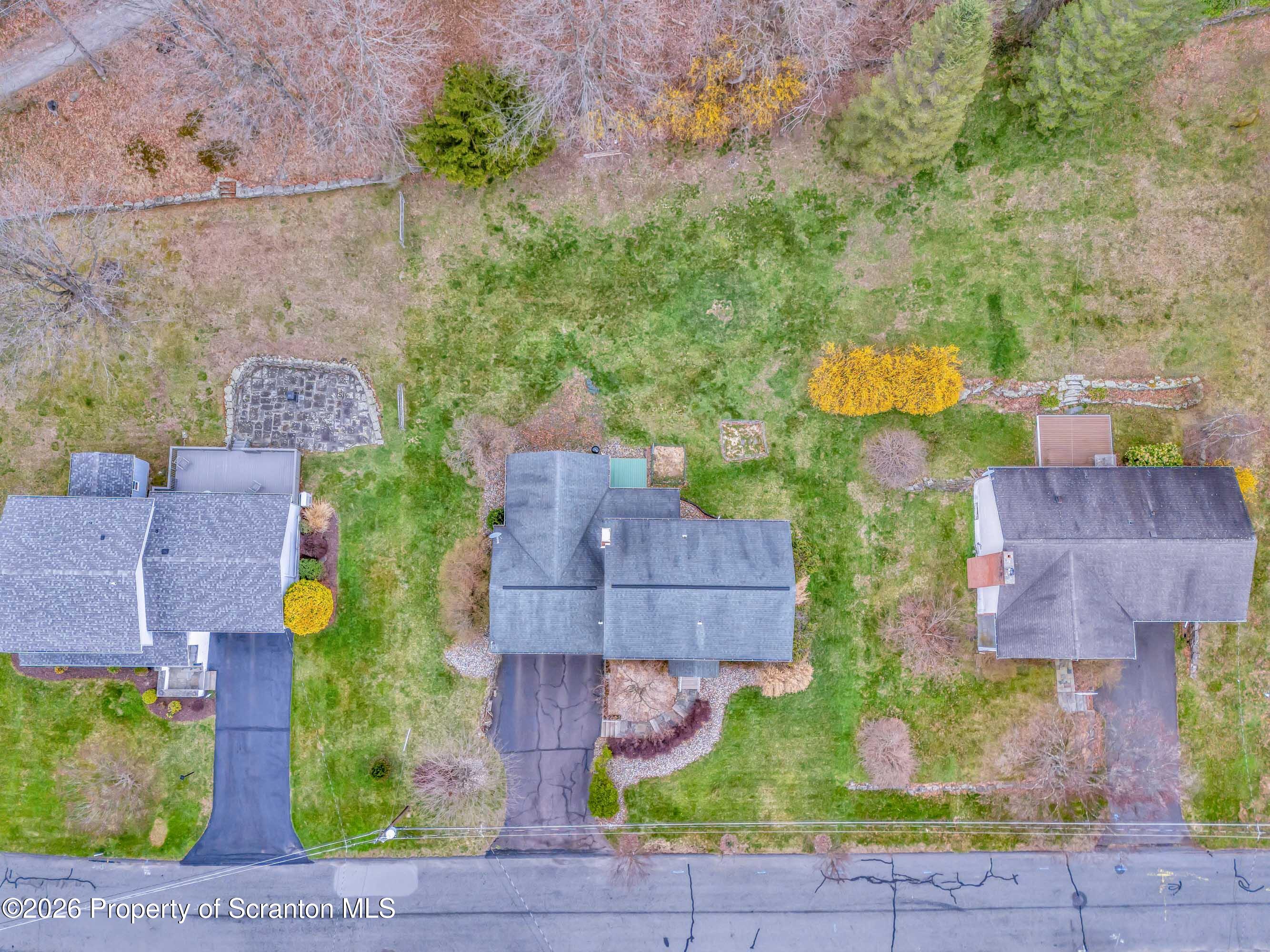 108 Sturbridge Road Clarks Summit, PA 18411 - Photo 10 of 67 an aerial view of houses with yard